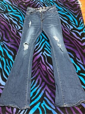 Distressed Dark Blue Flare Jeans - Women's